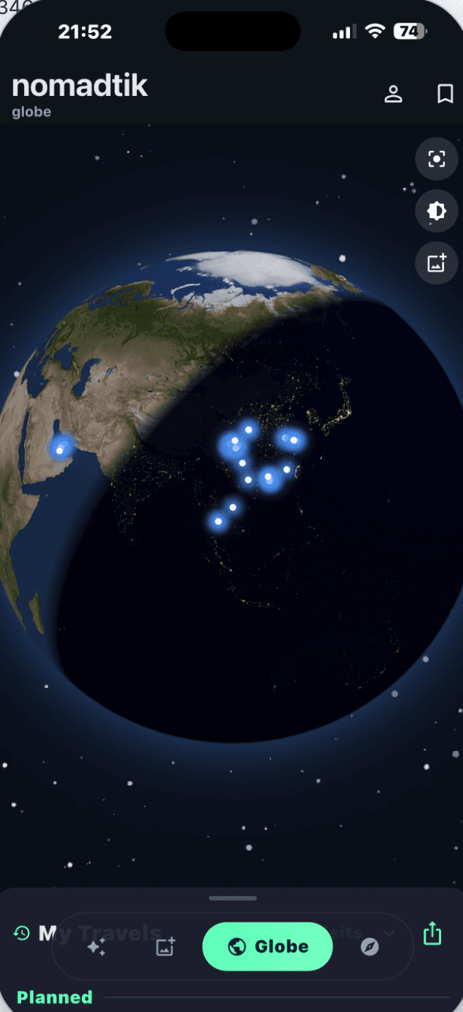nomadtik interactive 3D globe with planned destinations glowing across continents
